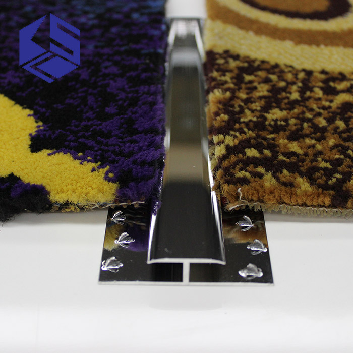 High level metal edge trim strip for carpet