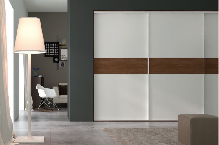 new bedroom wardrobe closet designed with sliding doors