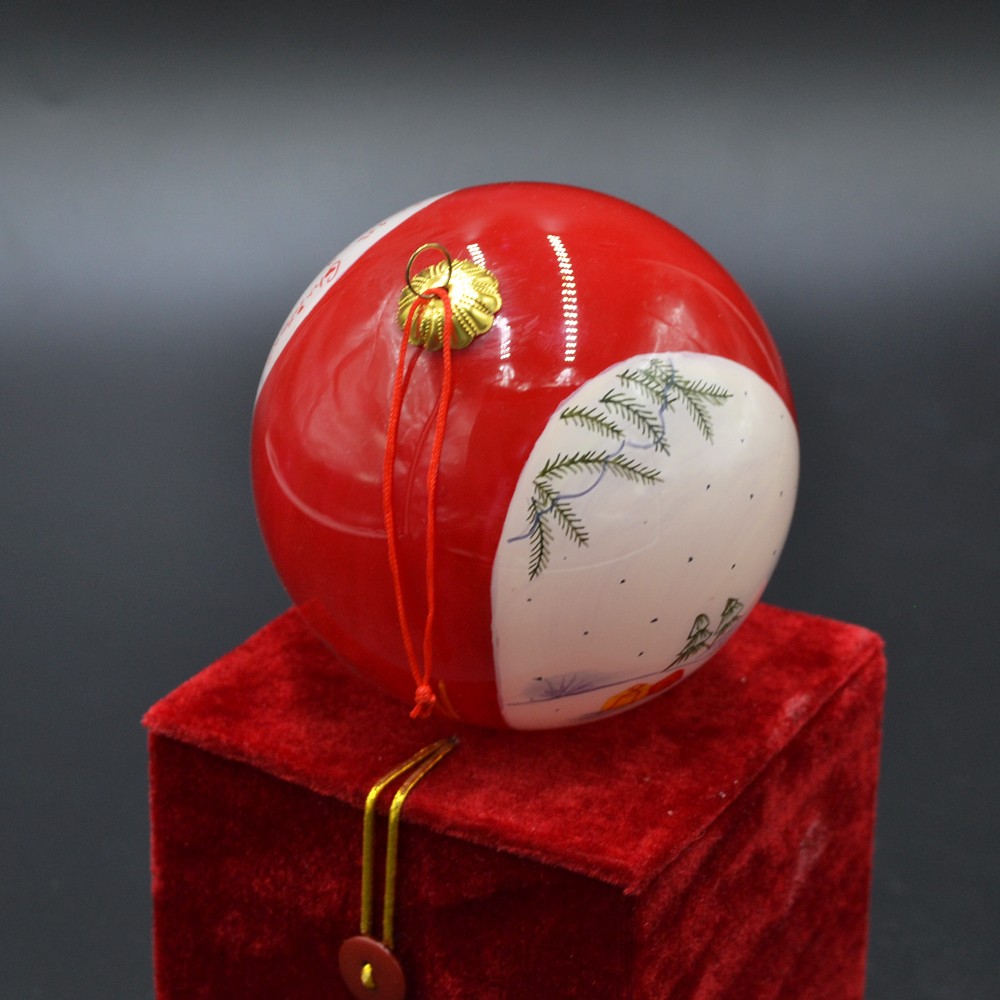 inside painting glass Christmas bauble for Christmas tree