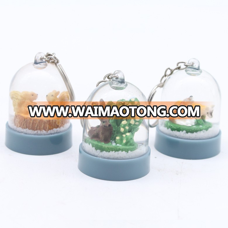 Customized personal design animal plastic keychain snow globe