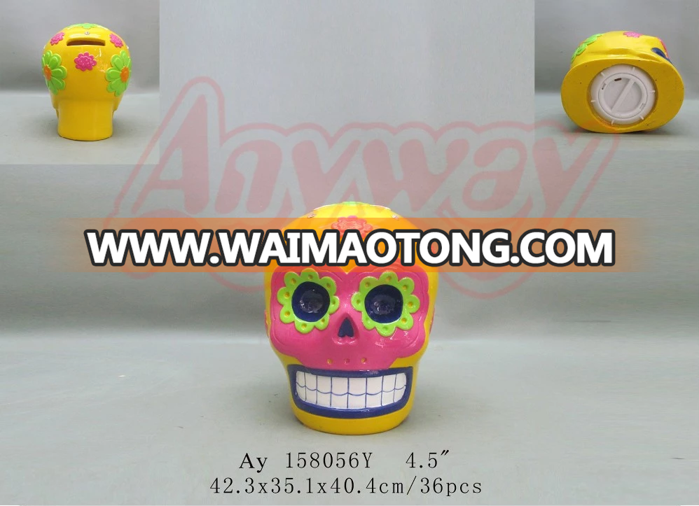 Yellow skull heads piggy bank coin bank