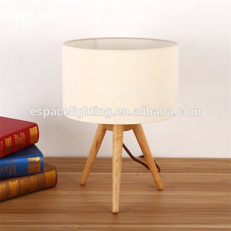 Modern wood tripod base table lamp with edison bulbs