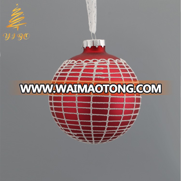 Red glass ball ornament with many kinds of design on surface for Christmas decoration