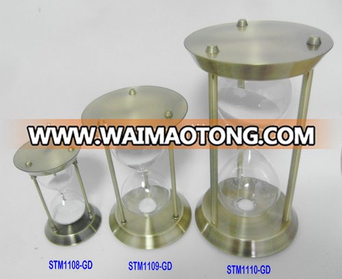 glass sand timer with metal frame; metal hourglass