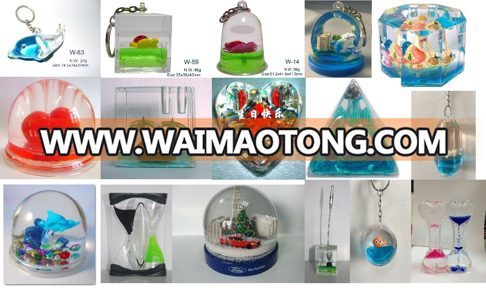 dolphin plastic keychain snow globe holder