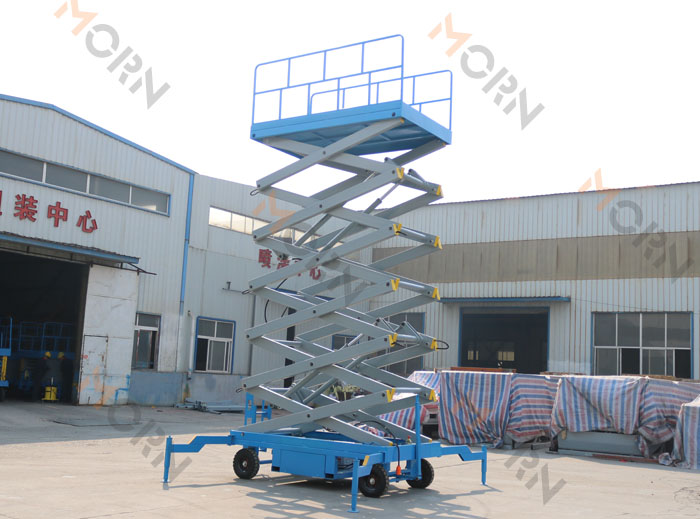 Trailing mobile scissor man lift equipment