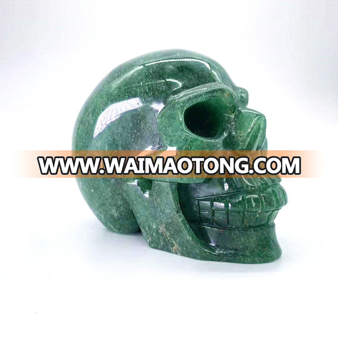 Wholesale natural hand carved crystal green strawberry stone skulls crystal craft skull for decoration