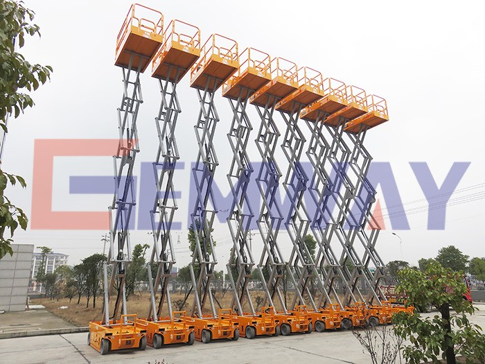 One man operating battery powered self-propelled scissor lift