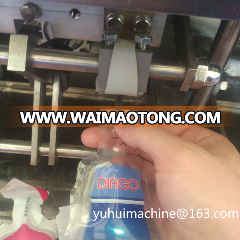 Bottle shape sachet water juice drink bag pouch filling sealing packing machine pure water liquid filling sealing machine